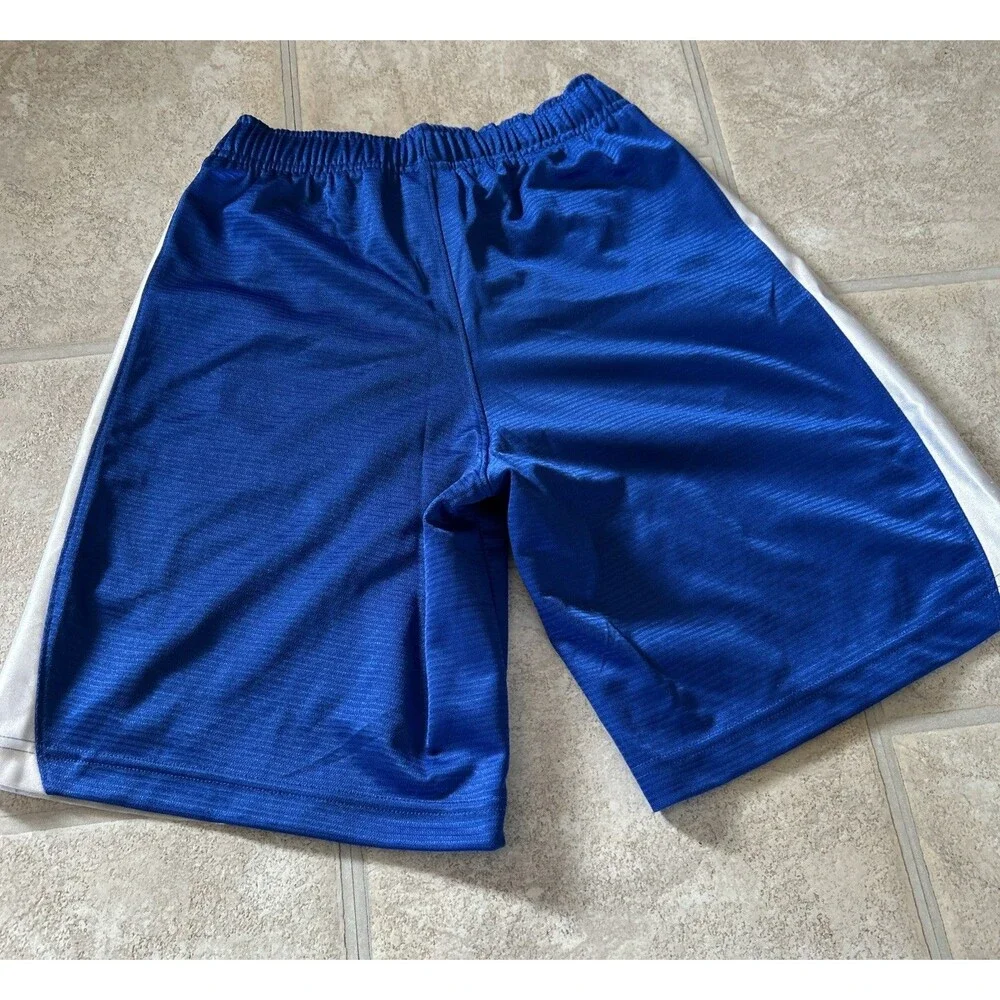 Nike athletic shorts Boys Size Small with pockets blue white
